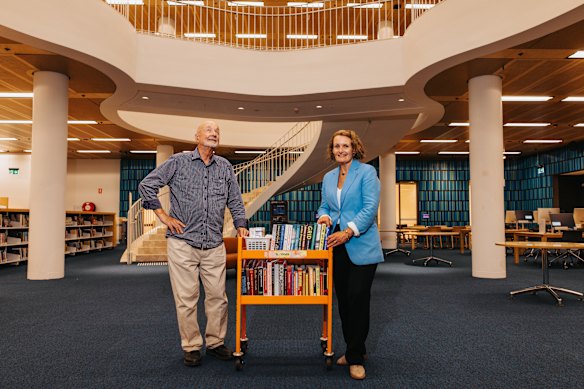 Into the void they looked. 
Andrew Andersons and State Librarian Caroline Butler-Bowdon in the newly updated bottom floor of the Marie Bashir reading rooms. It now a huge void letting light into the underground space. 