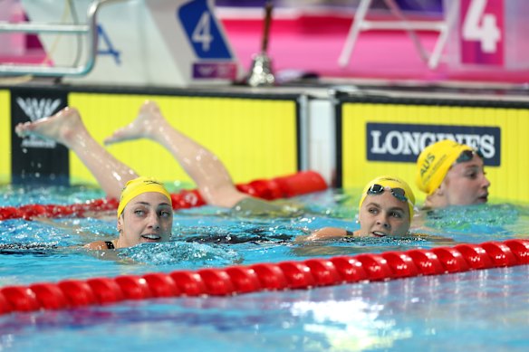 Meg Harris, Mollie O’Callaghan and Shayna Jack after Australia went 1-2-3 in the women’s 100m freestyle. 