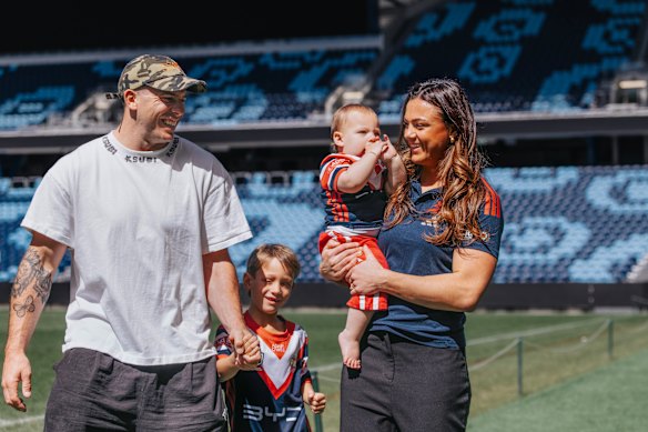 Millie Elliott with her partner Adam, their daughter Gigi and his son Lenny.