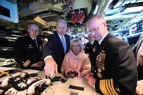 US Fleet Forces Commander Daryl Caudle, right, with then president Joe Biden in a Virginia-class submarine in 2022.