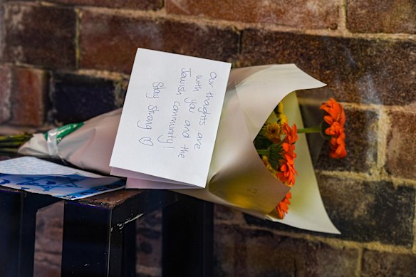 Flowers and notes outside Avner’s following the news of its closure.