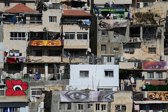  Murals on the houses of the Batn al-Hawa neighbourhood seek to draw attention to the eviction of Palestinians from their homes.
