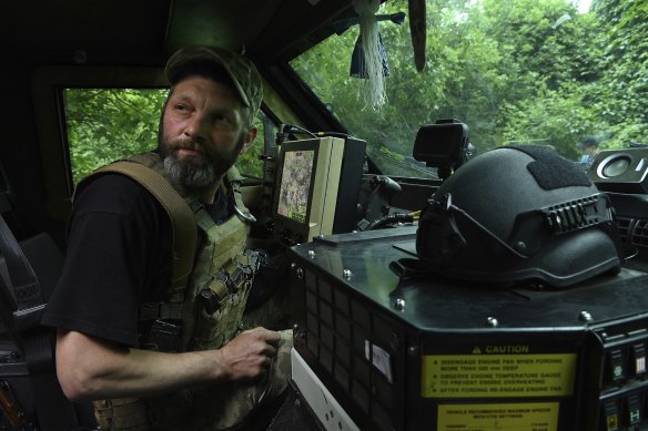 A montanka doll, a good luck charm, hangs from the windscreen of the Bushmaster.