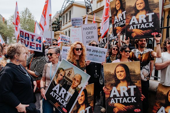 Protesters gather outside Parliament House on Tuesday. 