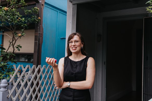 Fifth-year law student and paralegal Lucy Long uses a Barbie flip phone. 