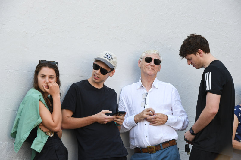 Seven’s commercial director Bruce McWilliam, second from right, was bidding at the auction on behalf of his son.