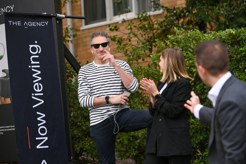 Luke Saville (right) takes a bid for 2/9 Fordholm Road, Hawthorn.