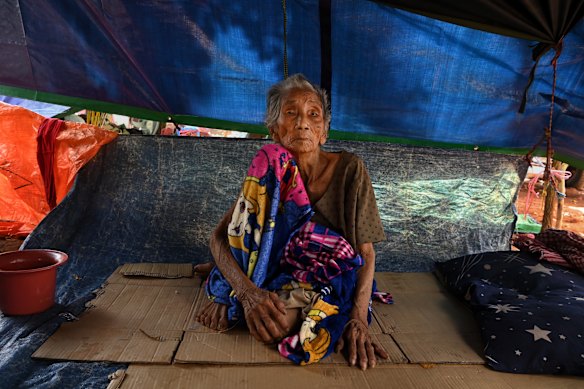 Ron Touch, aged 98, sits in her family&rsquo;s shelter at the Batthkav primary school.