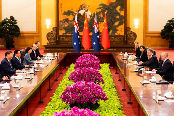 Press photographers were allowed to capture the meeting between the delegations, but not the leaders’ handshake.