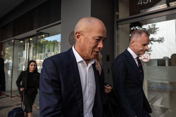 Neurosurgeon Charlie Teo departs a Health Care Complaints Commission Professional Standards Committee inquiry in February 2023.