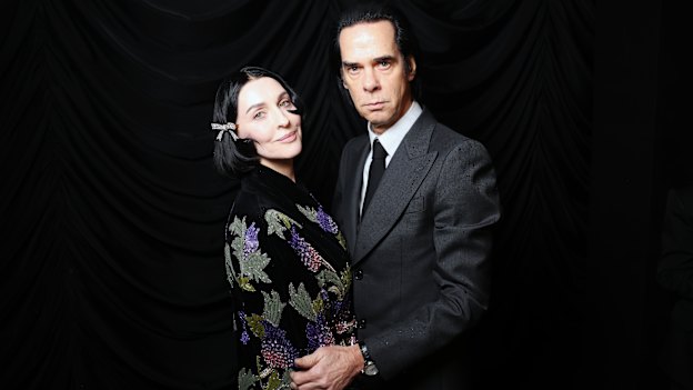 Susie and Nick Cave at a Paris Fashion Week show last year.