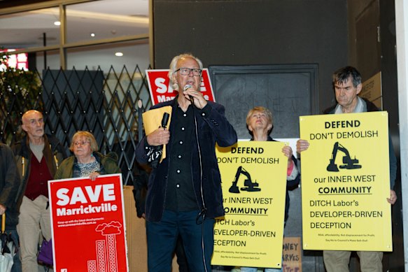 Hall Greenland speaks at the rally against the scheme, which proposes taller buildings of mostly six to 11 storeys clustered around Marrickville, Dulwich Hill, Croydon and Ashfield train stations.