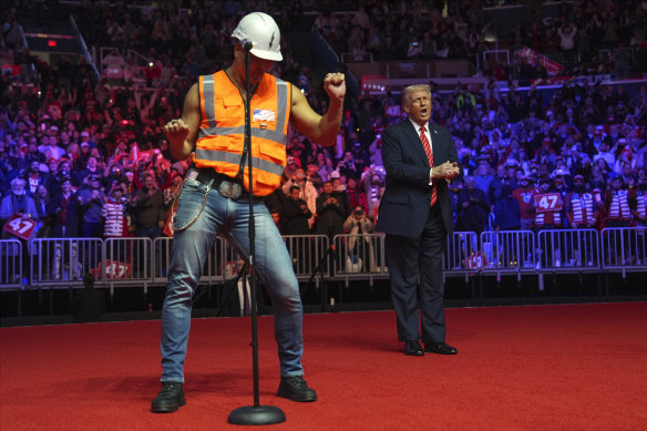 President-elect Donald Trump dances with Village People at a rally ahead his inauguration.