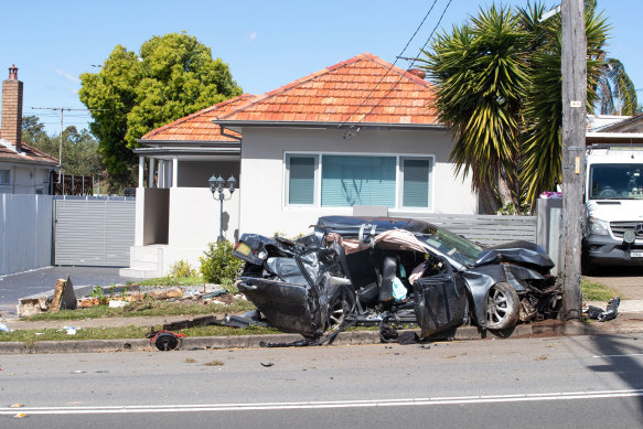 Debris is scattered over the road after a car crash. 