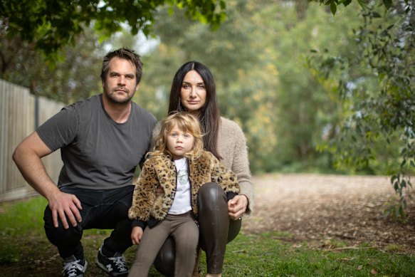 Linda Scott, with husband Liam Cooney and daughter Remi, wants the council to change the way it allocates kindergarten places so local families have priority.