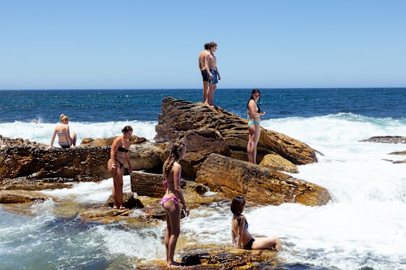 People cool off at Coogee Beach on Friday.