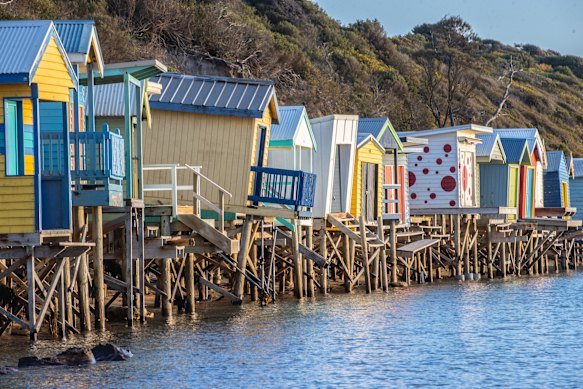 Beach boxes under threat by coastal erosion in Mount Martha North. 