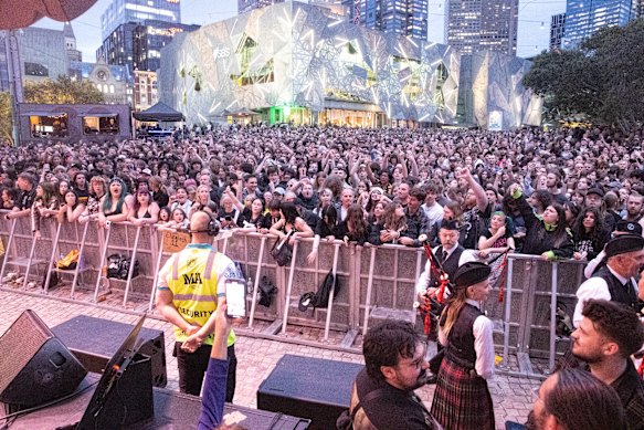 Thousands of people gathered at Federation Square on Friday for the gig.