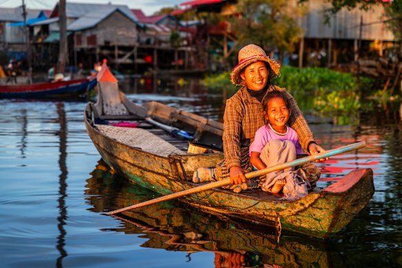 A mother and daughter paddle along Tonle Sap, South-East Asia’s largest freshwater lake. 