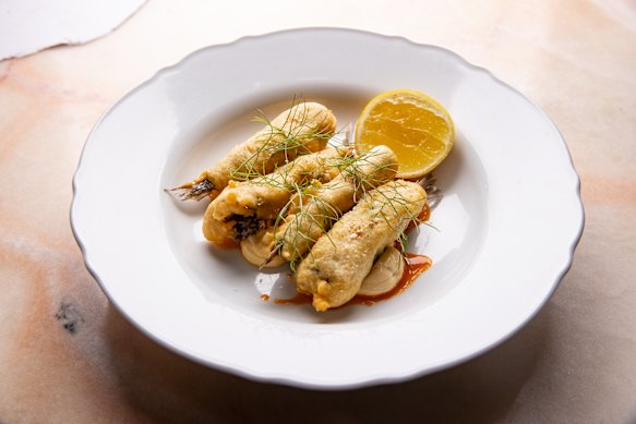 The fried sardines with salsa picante.