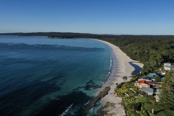Authorities have been accused of failing to do enough to make visitors to Jervis Bay aware of cancer-causing contaminants.