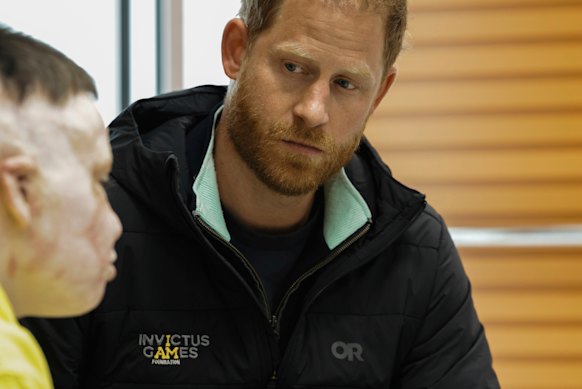 Prince Harry wore a jacket emblazoned with the name of his Invictus Games Foundation as he talked to wounded Ukrainian veterans.