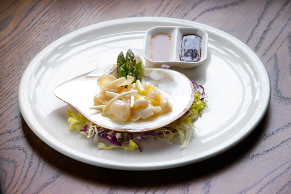 Paspaley pearl meat at Flower Drum, sauteed with spring onion and asparagus for $34 per person.