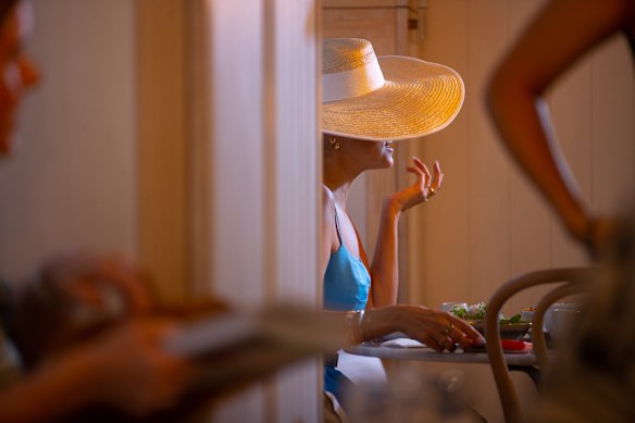 Lunch with Fashion Critical, wearing a pale blue Rebecca Vallance dress, who takes her anonymity seriously.