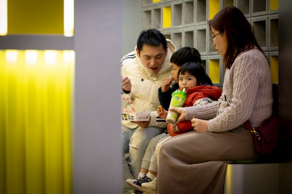 A family visiting Taning Lemontea in Box Hill, Melbourne, in July.