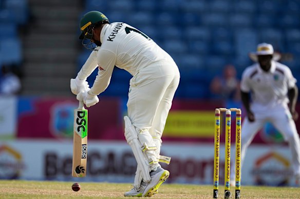 Australia’s Usman Khawaja is out lbw. 