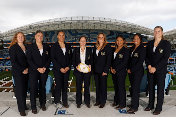 Wallaroos Coach Jo Yapp (centre) poses for a photo with squad members Brianna Hoy, Piper Duck, Siokapesi Palu, Emily Chancellor, Katalina Amosa, Cecilia Smith and Kaitlan Leaney during the Wallaroos World Cup squad announcement.