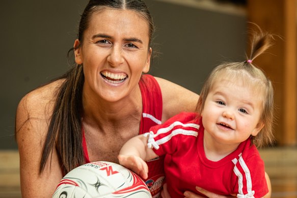 NSW Swifts star Maddy Proud and daughter Lily.
