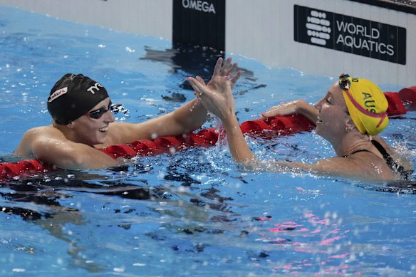 Katie Ledecky (left) and Lani Pallister embrace.