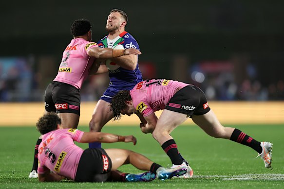 Kurt Capewell carries the ball for the Warriors.