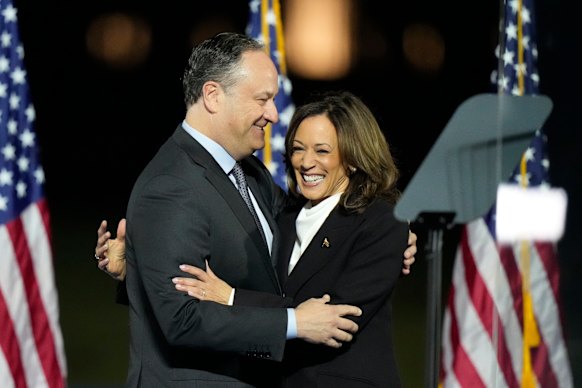 Harris and her husband Douglas Emhoff on the election trail last October.