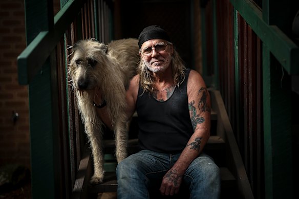 Bikie Stephen Mallet and his dog Tucka in Bright. His property had been raided by police not long after Dezi Freeman killed two police officers in Porepunkah.