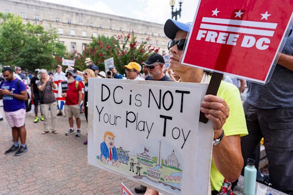 Free DC activists gather outside Metropolitan Police Department headquarters in Washington, DC, on Friday.