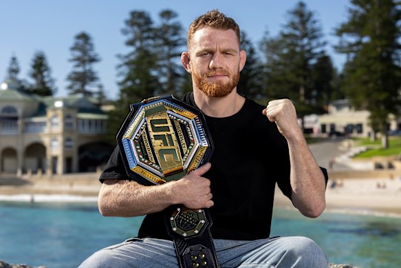 Perth UFC champion Jack Della Maddalena poses in Cottesloe after returning home with the UFC Welterweight Championship belt.