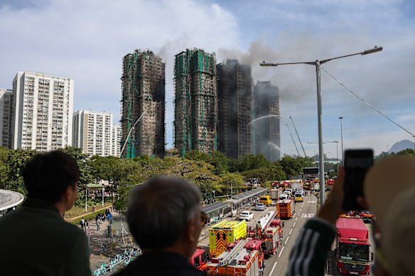 Fire services continue rescue efforts at affected buildings in the Tai Po District, Hong Kong.