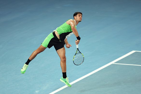 Carlos Alcaraz serves against Australia’s Adam Walton in Sunday’s round-one win at Melbourne Park.