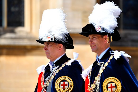 Andrew, left, and his brother Prince Edward in the Order of The Garter Service procession at Windsor Castle in 2019.