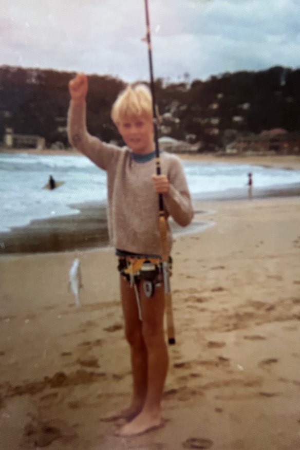 A young Peter with a fish he caught off Avoca Beach. 