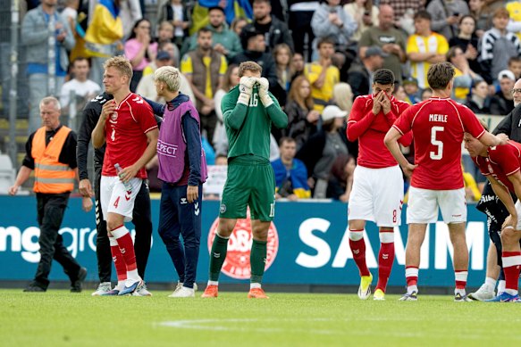 Denmark players show their distress after Eriksen’s second on-field collapse.