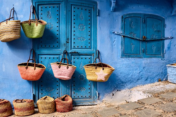 The narrow blue-daubed streets of Chefchaouen, are full of shops, such as this one, selling handmade wares.