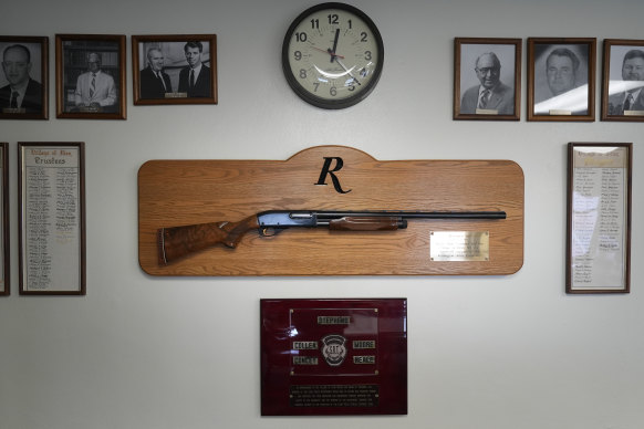 A shotgun made by Remington Arms, gifted by the company to the town, hangs on the wall of the municipal building.