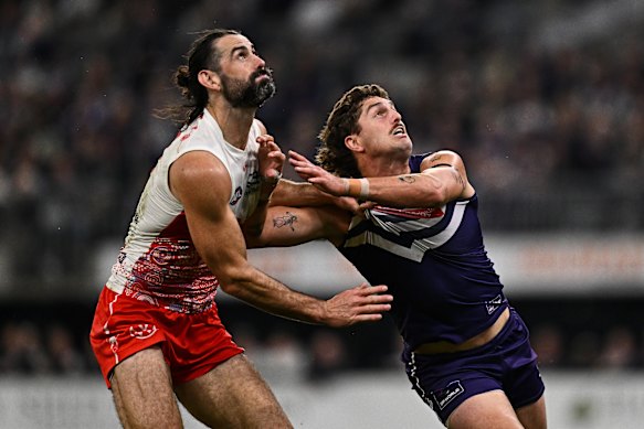 Brodie Grundy tussles with Luke Jackson in the last meeting between the sides, in Perth in July.