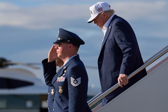 President Donald Trump leaving Air Force One on Sunday.