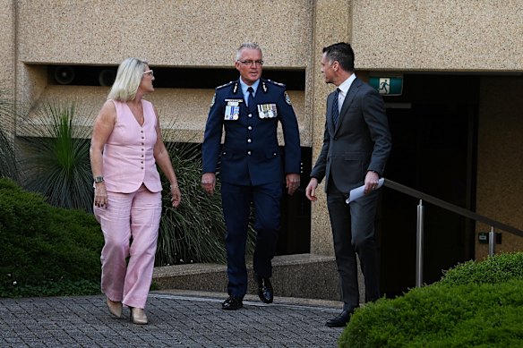 NSW Minister for Police and Counter Terrorism Yasmin Catley (left), former Deputy Commissioner of NSW Police Mal Lanyon (centre) and NSW Premier Chris Minns (right) arrive at a press conference announcing Mal Lanyon as the new NSW Police Commissioner. 