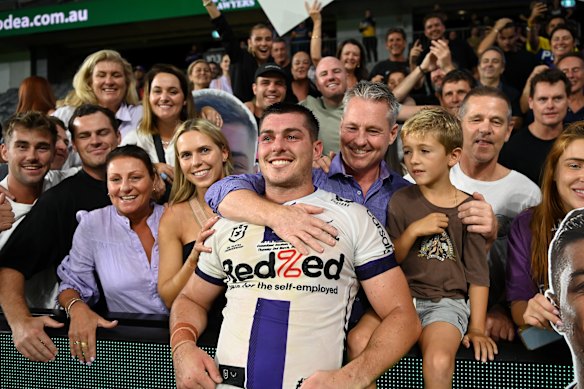 Bronson Garlick celebrates his NRL debut with family and friends in 2023.