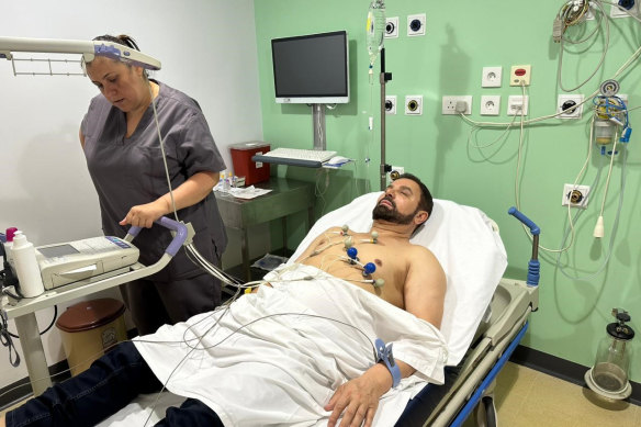 Jean Nassif has submitted a photograph   of himself successful  a Lebanese infirmary  arsenic  impervious  of a aesculapian  ailment preventing him returning to Australia.